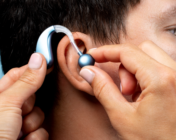 man-wearing-hearing-aids-side-vi (1) (2)